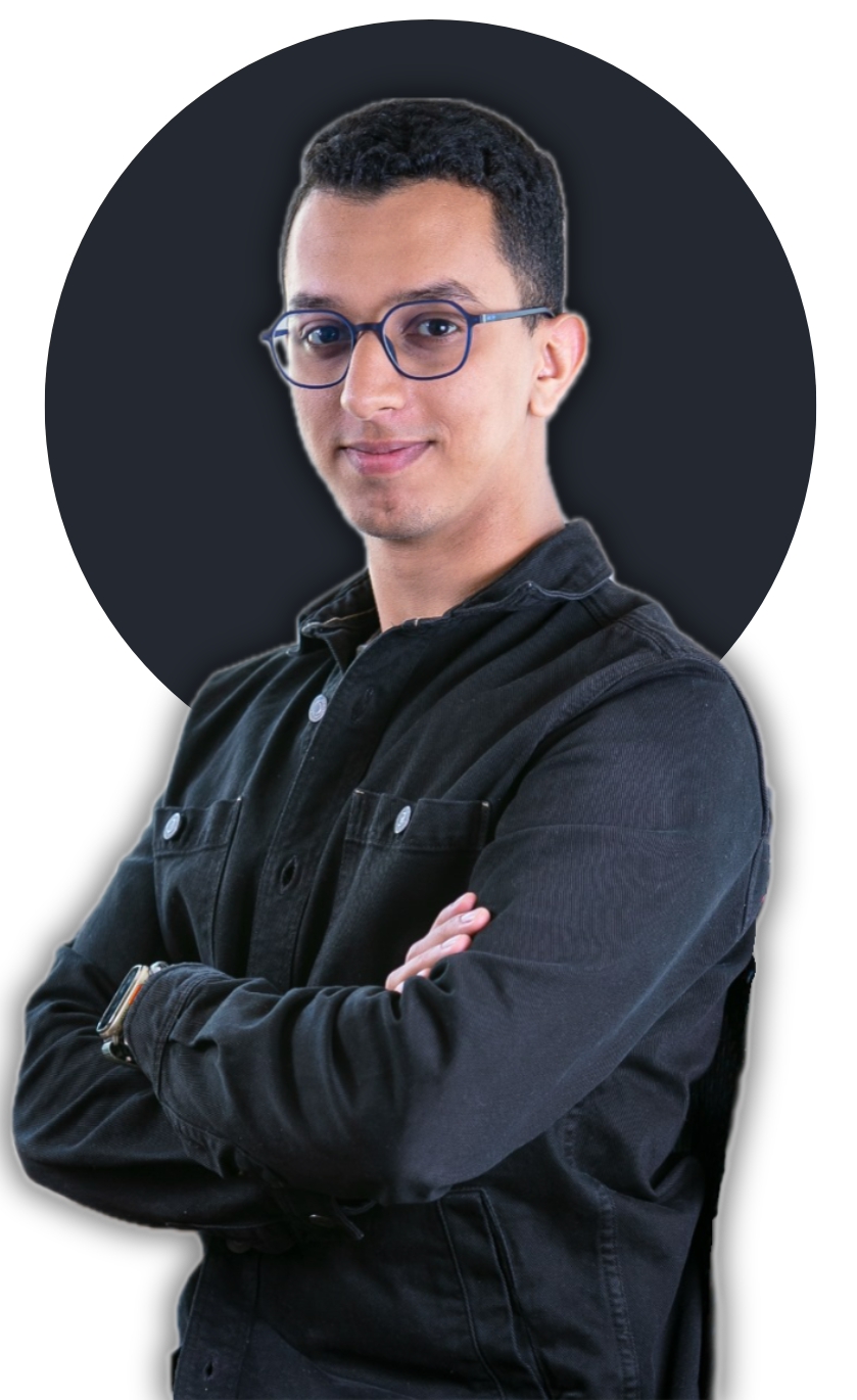 Amine Benbelaid smiling and facing forward in a professional setting with a neutral background, conveying a friendly and approachable mood